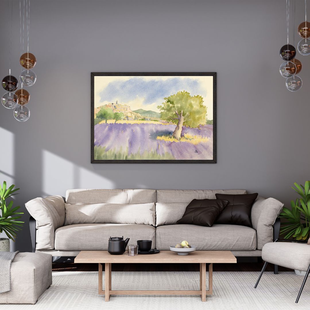 Black framed lavender field print of a lavender field hanging in a lounge